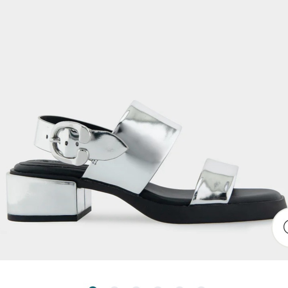 Silver mirror metallic comfort women banded back strap low block heel sandal.